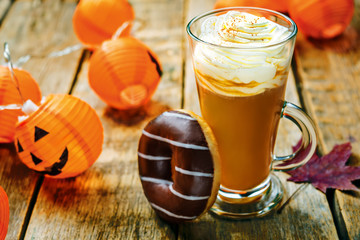 Pumpkin spice latte with whipped cream and cinnamon
