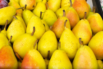 Sweet ripe yellow pears, healthy organic fruits