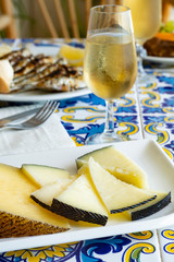 Andalusian food, chees en espeto, Malaga style fish on stick barbecue served with dry fino sherry wine