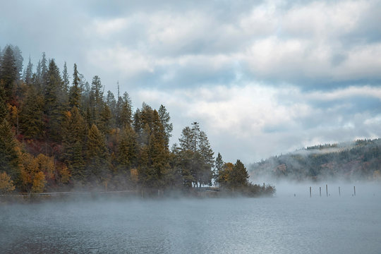 Original photograph of fog coming off the lake in autumn
