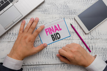 Conceptual hand writing showing Final Bid. Concept meaning The decided cost of an item which is...