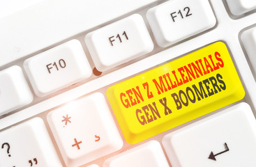 Conceptual hand writing showing Gen Z Millennials Gen X Boomers. Concept meaning Generational differences Old Young showing White pc keyboard with note paper above the white background