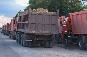 convoy of dumped trucks