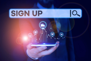 Conceptual hand writing showing Sign Up. Concept meaning use your information to register in website team college or blog Male wear formal suit presenting presentation smart device