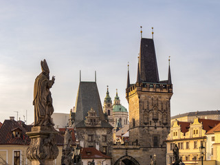 Fototapeta na wymiar Beautiful Tower of Charles Bridge with Background of Prague Landmarks, Capitol City of the Czech republic