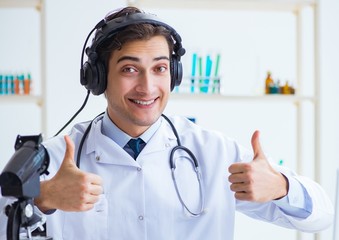 Male doctor listening to patient during telemedicine session