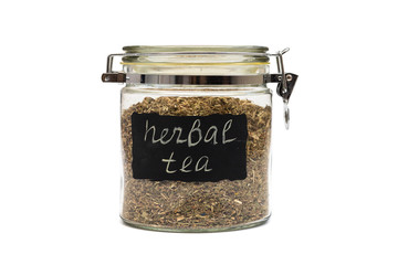 Herbal tea in a glass jar, flip-top closure, isolated on white