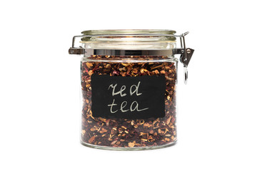 Red tea in a glass jars, flip-top closure, isolated on white background
