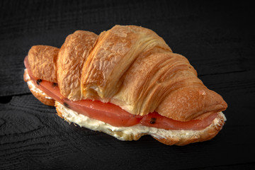Croissant sandwich with grapefruit jelly. Healthy, tasty, nourishing snack. Take away food
