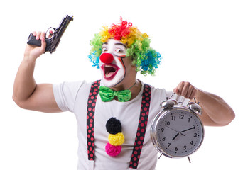 Funny clown with an alarm clock isolated on white background