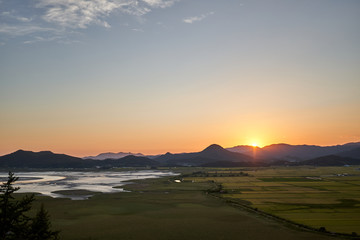 Fototapeta na wymiar A sunset view of the Sunchoenman Bay Wetland Reserve in South Korea.