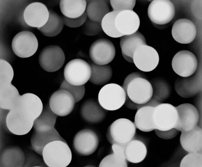 Atmospheric festive bokeh abstract in black and white