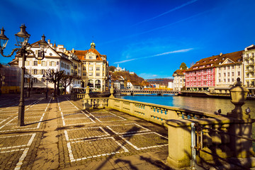 Old town buildings over Reuss river in Lucerne city, Switzerland