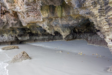 Stone hole on beach.