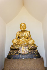 Golden Buddha in temple.