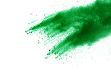 Obraz premium Green powder explosion on white background.