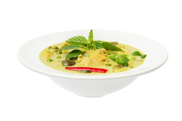Closeup plate of thraditional thailand meal - green curry with chicken and eggplants served in a plate isolated at white background.