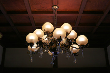 Antique chandelier in the living room of an old house