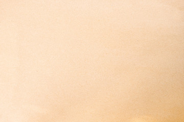 Old  texture brown cardboard sheet of empty paper background.