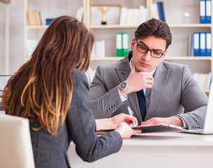 Business meeting between businessman and businesswoman