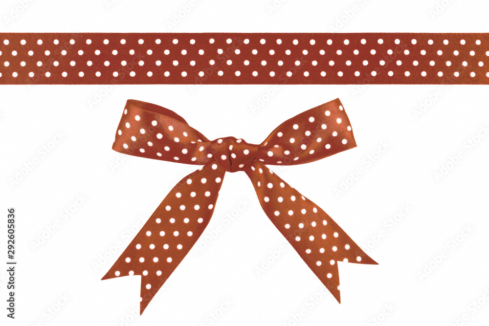 Wall mural Brown ribbon and bow isolated on white background - Wall murals