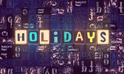 The word Holidays as neon glowing unique typeset symbols, luminous letters holidays