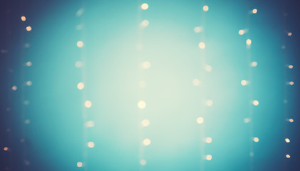 Abstract blurred shiny bokeh lights blue background