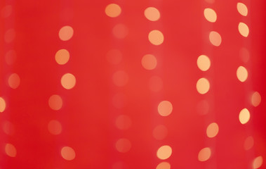 Abstract blurred shiny bokeh lights red background