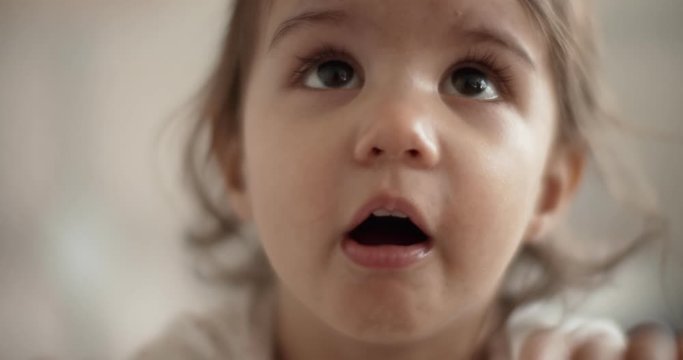 Close up shot of a little girl with flu, cold coughing. Shot in 4K RAW on a cinema camera.