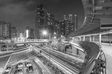 Traffic and skyline of downtown of Hong Kong city at night
