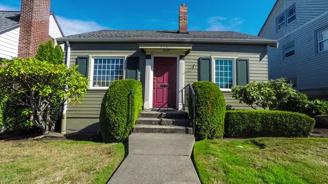 Small suburban home exterior departure; 4k dolly shot