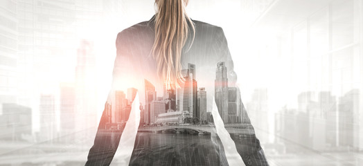 Double Exposure Image of Business Person on modern city background. Future business and...