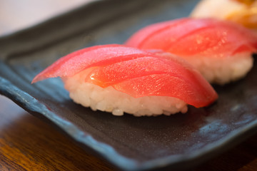 Fresh tuna fillet sushi, served on black slate
