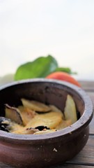 close up view on retro clayware on wooden table 