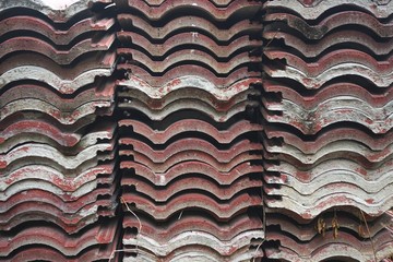 Stacks of nested roof tiles form an abstract pattern in rural Vietnam