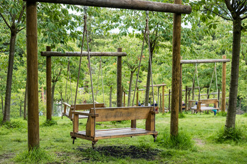 Wooden swing in Alnwick Garden, Northumberland, England