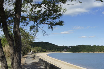 Fototapeta na wymiar Sandy beach on a sunny day, the coast of Tamano, Okayama