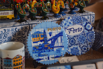 Traditional portuguese ceramic souvenirs for sale at Porto market