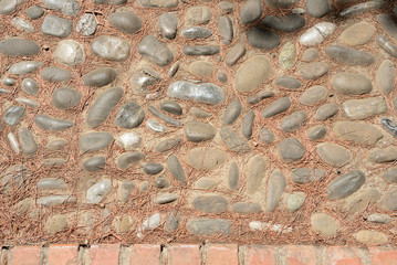 Old stone footpath close up. Abstract background
