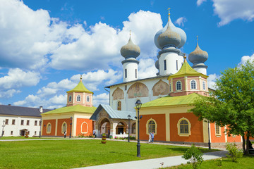 Fototapeta na wymiar Ancient Assumption Cathedral on a sunny July day. Tikhvinsky Assumption Monastery
