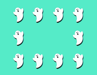 青緑バックに白いオバケを沢山並べてコピースペースもあります