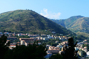 Fototapeta premium View of Cefalu town from the Rocca di Cefalu in the early morning. Sicily, Italy
