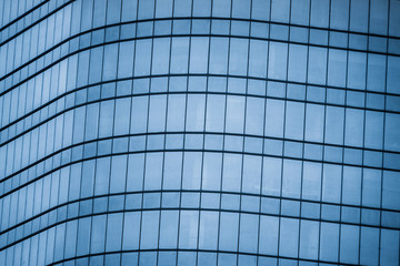 Urban abstract - windowed corner of office building.