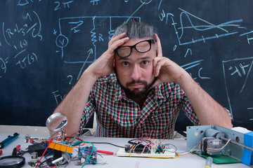 Tech postgraduate student working on electronic project