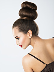 Fototapeta premium Beautiful sensual woman with creative hairstyle