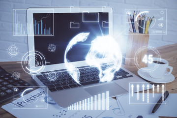 Stock market graph and table with computer background. Multi exposure. Concept of financial analysis.