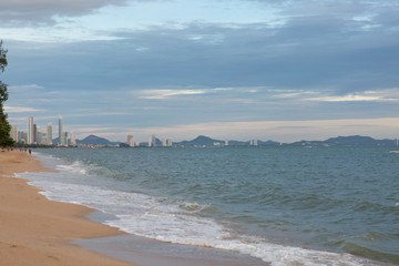 Sand beach water surf. Blue sea wave.