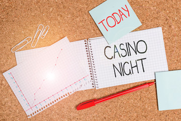 Writing note showing Casino Night. Business concept for event where can experience the fun playing in a real casino Desk notebook paper office paperboard study supplies chart