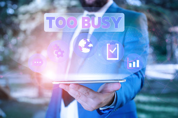 Text sign showing Too Busy. Business photo showcasing No time to relax no idle time for have so much work or things to do Male human wear formal work suit presenting presentation using smart device