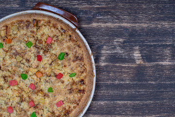 Homemade organic apple pie dessert ready to eat, close up. Apple tart with walnut. Close up